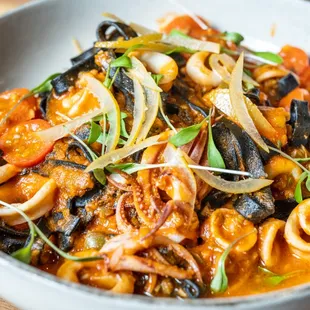 SQUID INK FETTUCCINE, squid, Castelvetrano olives, marinara, cherry tomatoes, preserved Meyer lemon