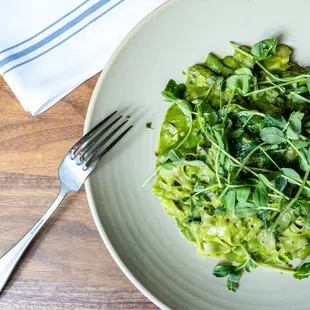 VEGAN PASTA FETTUCCINE, arugula and avocado pesto, pea shoots, sugar snap peas, leeks