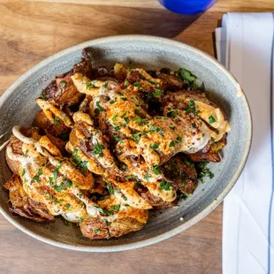 Harissa Roasted Potatoes, herbed tahini