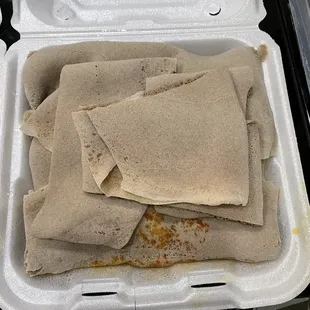 Shrimp curry - surprise buried in a generous pile of injera!