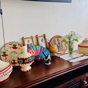 a variety of hats on a table