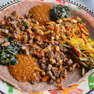 Beef and tilapia with veggie sides