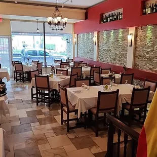 a restaurant with tables and chairs