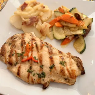 Grilled chicken with mixed vegetables and roasted potatoes