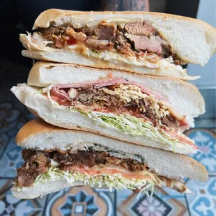 Top- Picante roast pork, Middle is the island trio and the bottom sandwich is the pavochon al mojo.