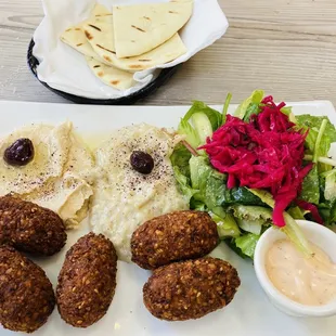 Falafel Plate includes pita, salad, hummus, and Babaganoush; A good amount of food and all of it tastes great.