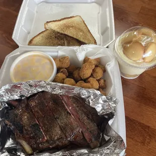 2 Meat Plate with brisket and pork ribs, fried okra, mac and cheese. Homemade Banana Pudding on the side.
