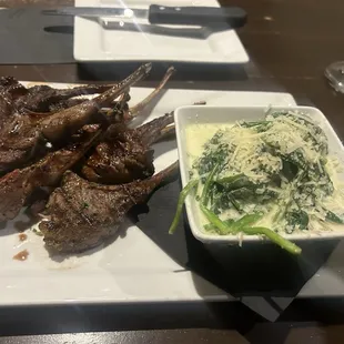 New Zealand lamb chops with sautéed spinach.