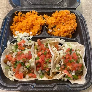 Three chicken taco plate - Food is decent. I like their rice. The chicken can be salty at times.