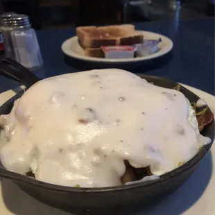 Country skillet add gravy instead of cheese. They charged $2.50 for that.