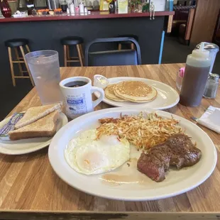 two plates of breakfast food