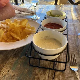 Queso, guacamole, salsa and hand cut tortilla chips