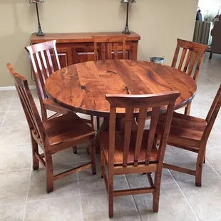 43" round mesquite dinette with mesquite and ironwood chairs.