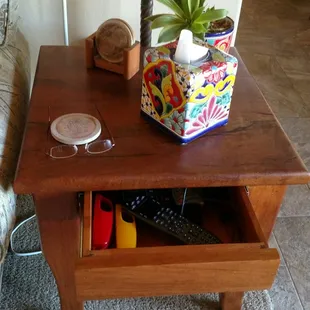 End table with drawer out.