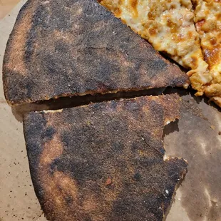 a burnt pizza