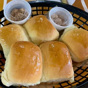 Complimentary dinner rolls with cinnamon butter.