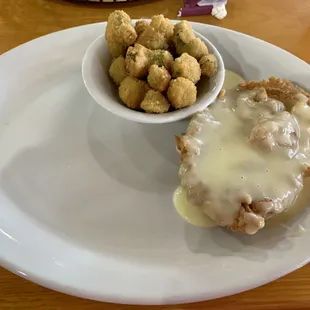 4 oz chicken fried steak with a sweet cream gravy.  Plus fried okra.