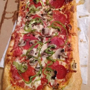 8 Cut Sicilian with Pepperoni, Mushrooms and Green Peppers.