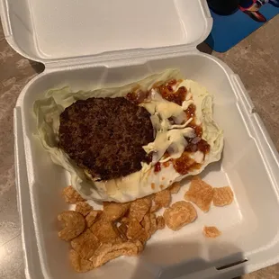 a meal in a styrofoam container