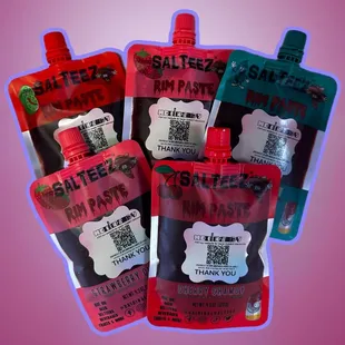 a variety of small pouches of food