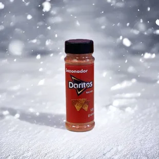 a bottle of donuts in the snow