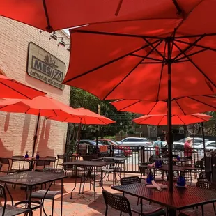 Outside seating with plenty of cover and fans.