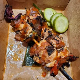 chicken skewers with pickles and cucumbers