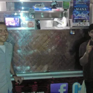 Jose, who makes the magical burritos, is on the right.