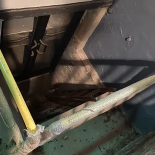 the inside of a building with pipes and pipes