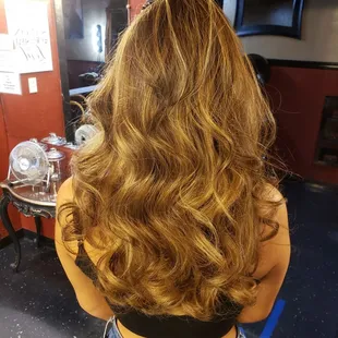 balayage with a light brown shadow root melte into a pale blonde with a hint of cooling violet