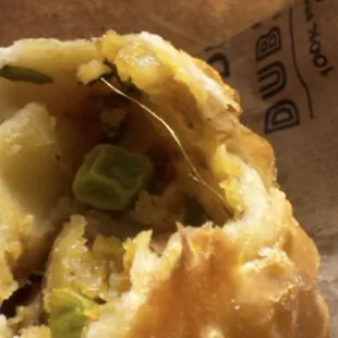 Human hair embedded in a Vegetable Samosa