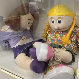 Giant puppets behind glass are tired. The ennui!