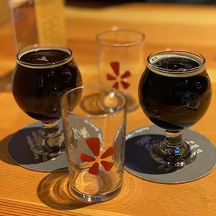 three glasses of beer on a table