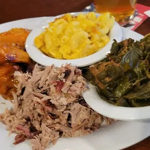 Combo tray wings, pulled pork, Mac n Cheese and collard greens