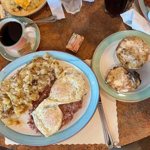 Corned Beef Hash with two over medium eggs and hash browns