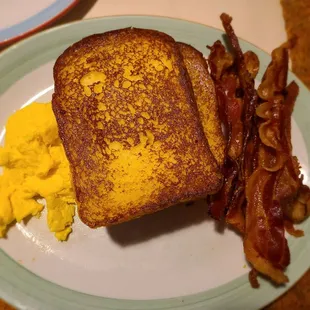 French toast with eggs and bacon.