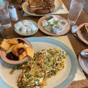 spinach feta tomato omelette, Fresh Fruit Cup, wheat toast
