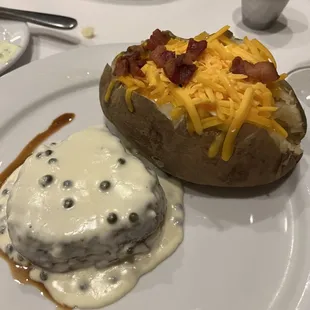 Filet with peppercorn sauce and baked potato