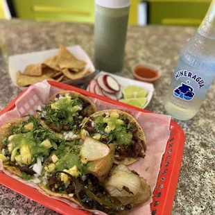 a plate of food and a bottle of water