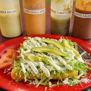 Shredded beef takos. Rolled takos. I&apos;ll describe as beef flautas.  I liked the two salsas on the left.