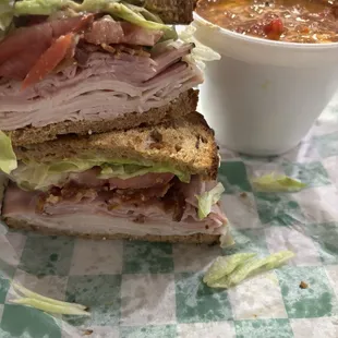 Triple threat on multigrain and cup of chili