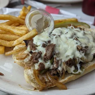 Philly cheesesteak and fries