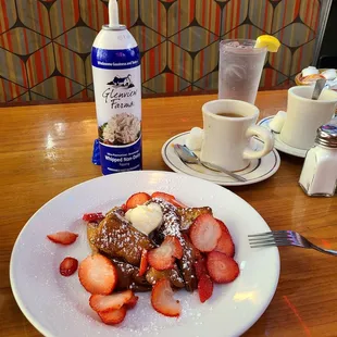 French Toast with strawberries  and a whole can of whipped cream.