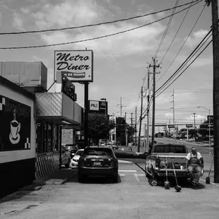 a black and white photo of a diner