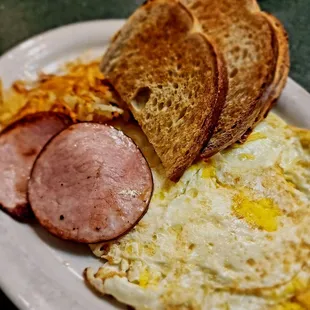Three egg platter with Canadian bacon