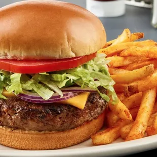 a hamburger and fries on a plate