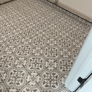 a tile floor in a bathroom