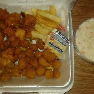 Shrimp,catfish nuggets,fried okra,fries and coleslaw