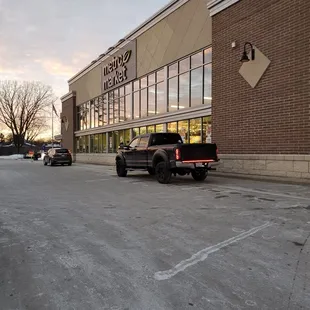 cars parked in front of the store