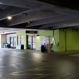 empty parking garage with signs